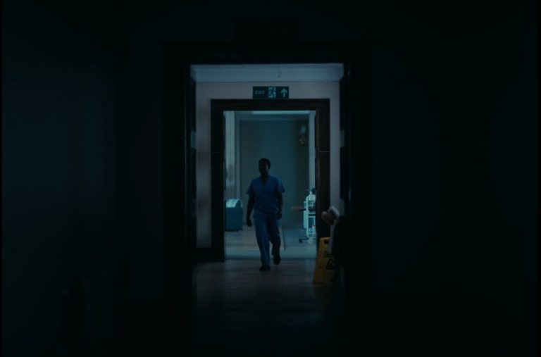 Nurse is walking in the hallway