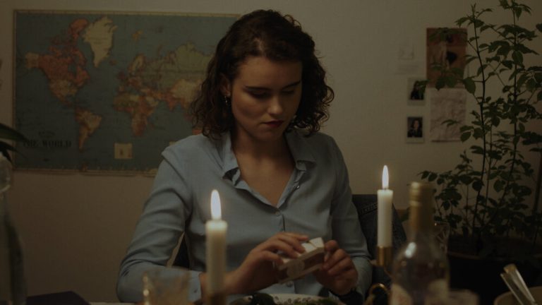 Woman at dining table